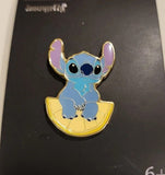 Stitch Sitting on a Lemon Slice Enamel Pin